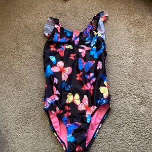 SO little girls bathing suit. NEVER WORN . Was too small. LIKE NEW.